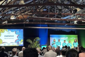 AI Hackathon team Empathy on stage at Aotearoa AI Summit 2025