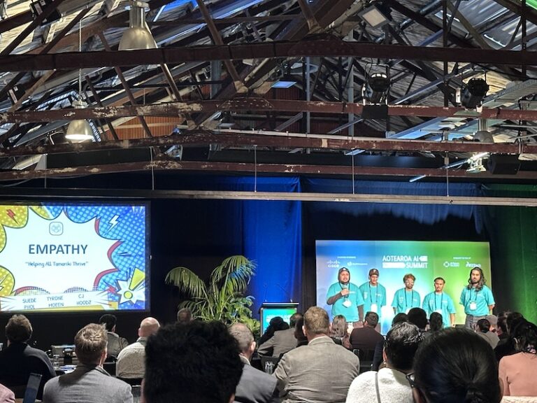 AI Hackathon team Empathy on stage at Aotearoa AI Summit 2025